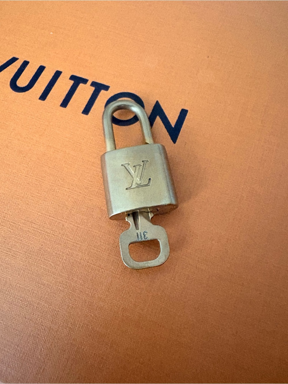 Louis Vuitton Brass-tone Padlock and Key in Metal Finish